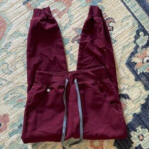 Fig’s maroon joggers